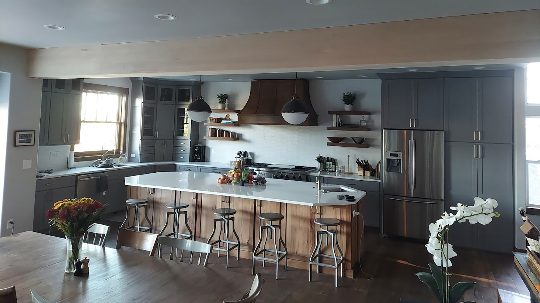 Kitchen remodel featuring painted cabinets, new hardware, and energy-efficient appliances.