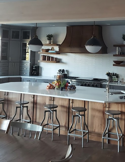 Kitchen remodel featuring painted cabinets, new hardware, and energy-efficient appliances.